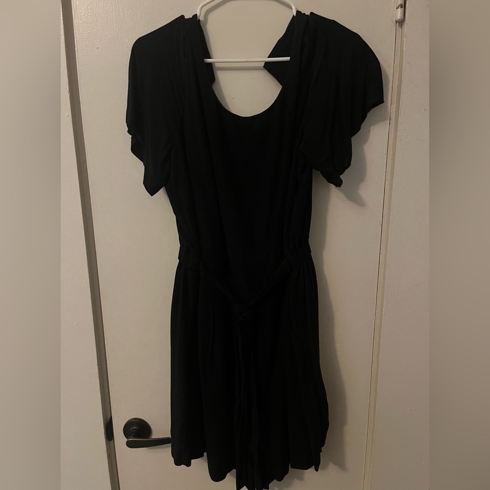 Black romper with front tie.